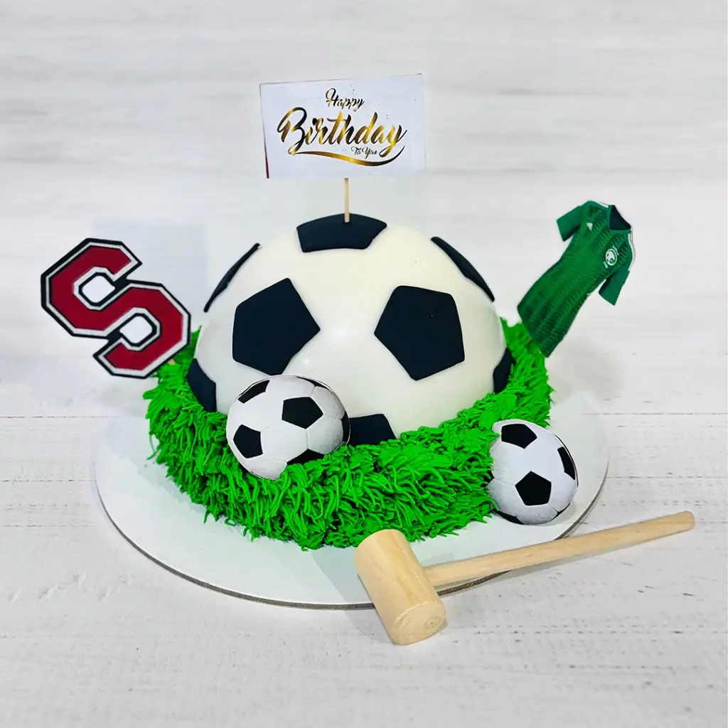 Pinata Football Surprise Cake